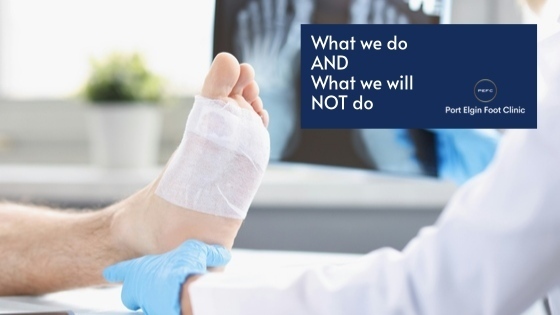 A chiropodist dressing a wound on a patient's leg in the foot clinic